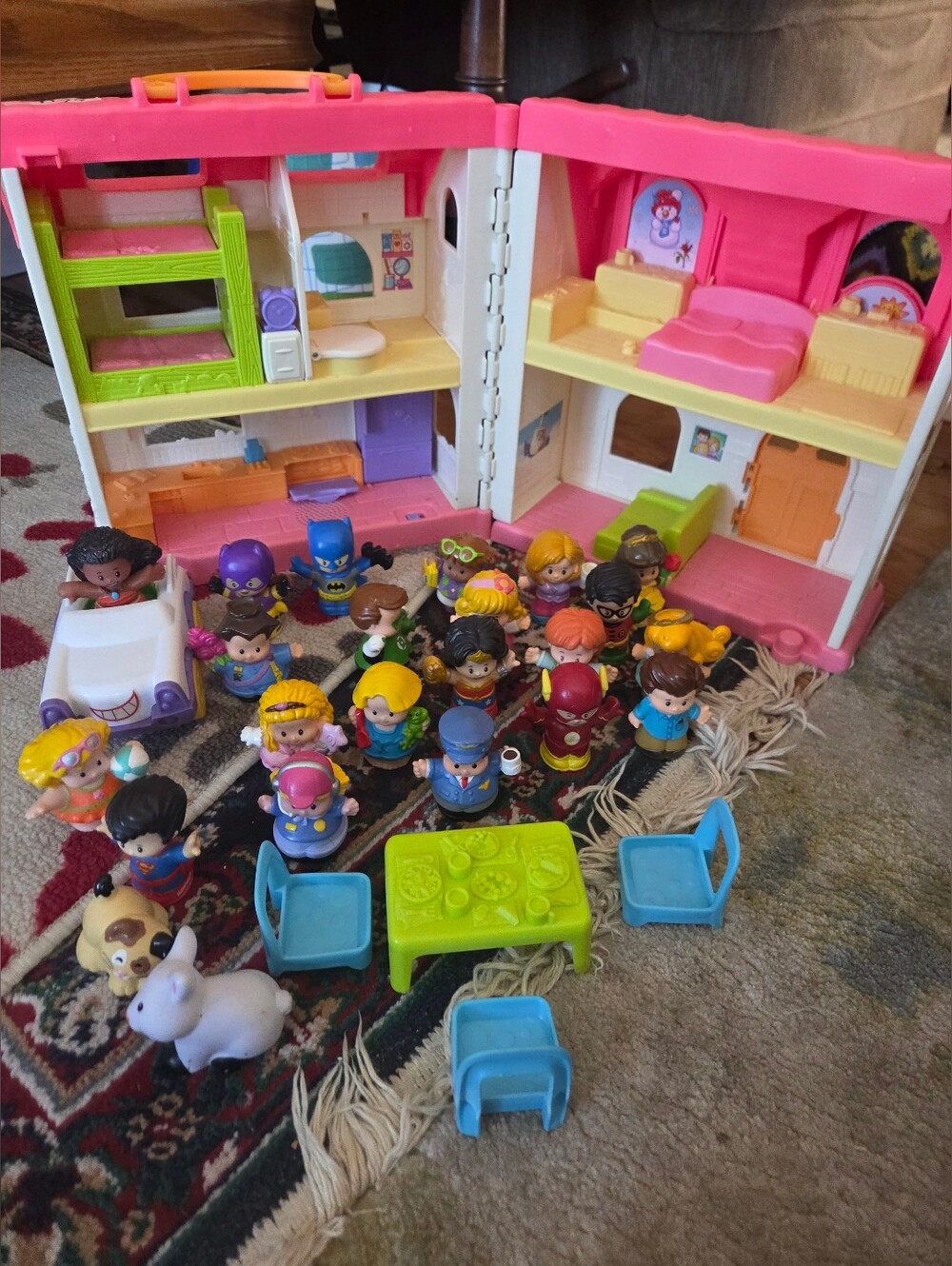 Fisher-Price Little People Playset with Pink Dollhouse and Assorted Figures